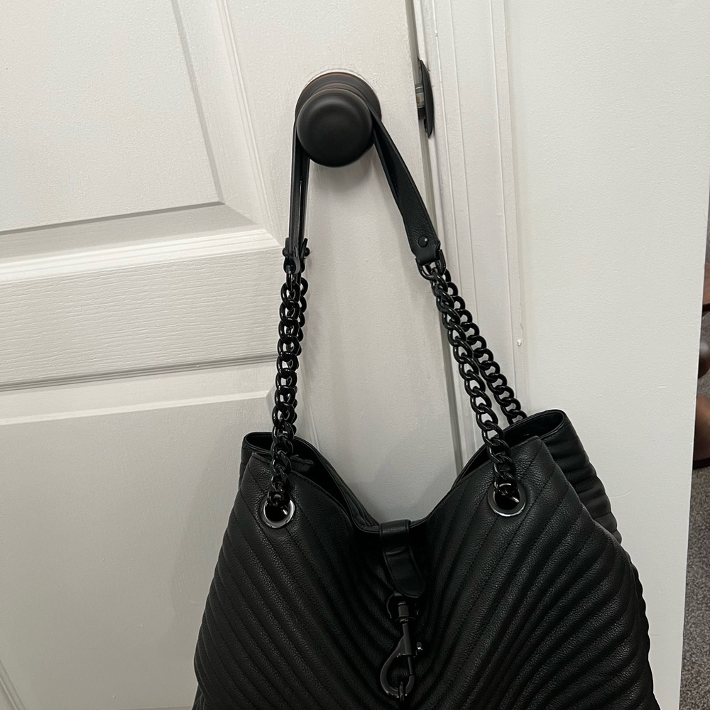 Beautiful black handbag, slight wear on the handles.